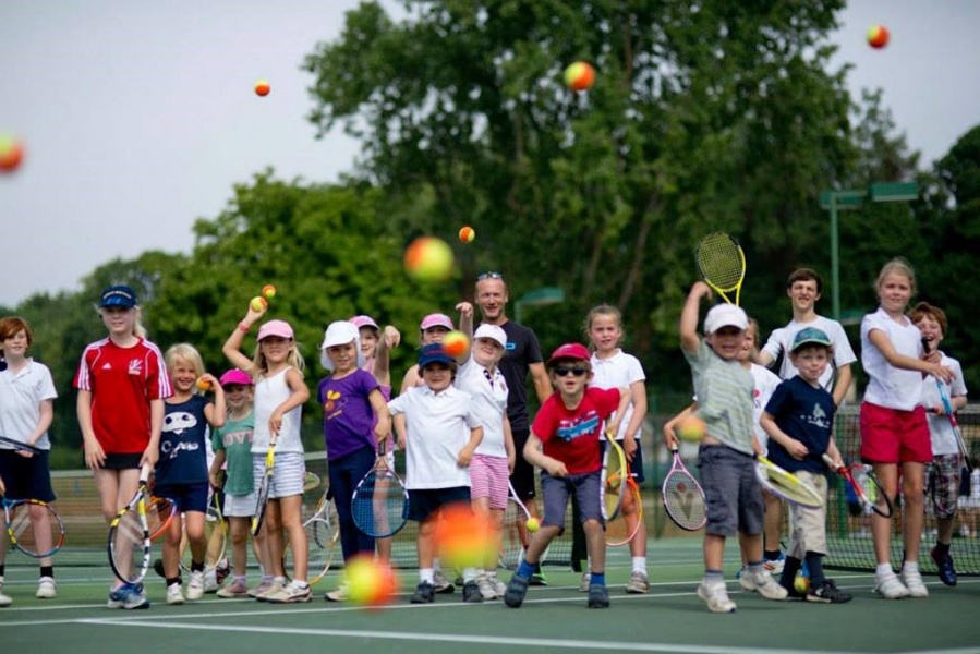 Children Learning Tennis