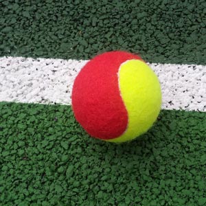 Tennis ball by line